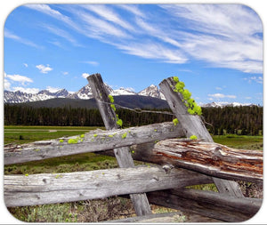 Mousepad Sawtooth Mountains & wooden fence.