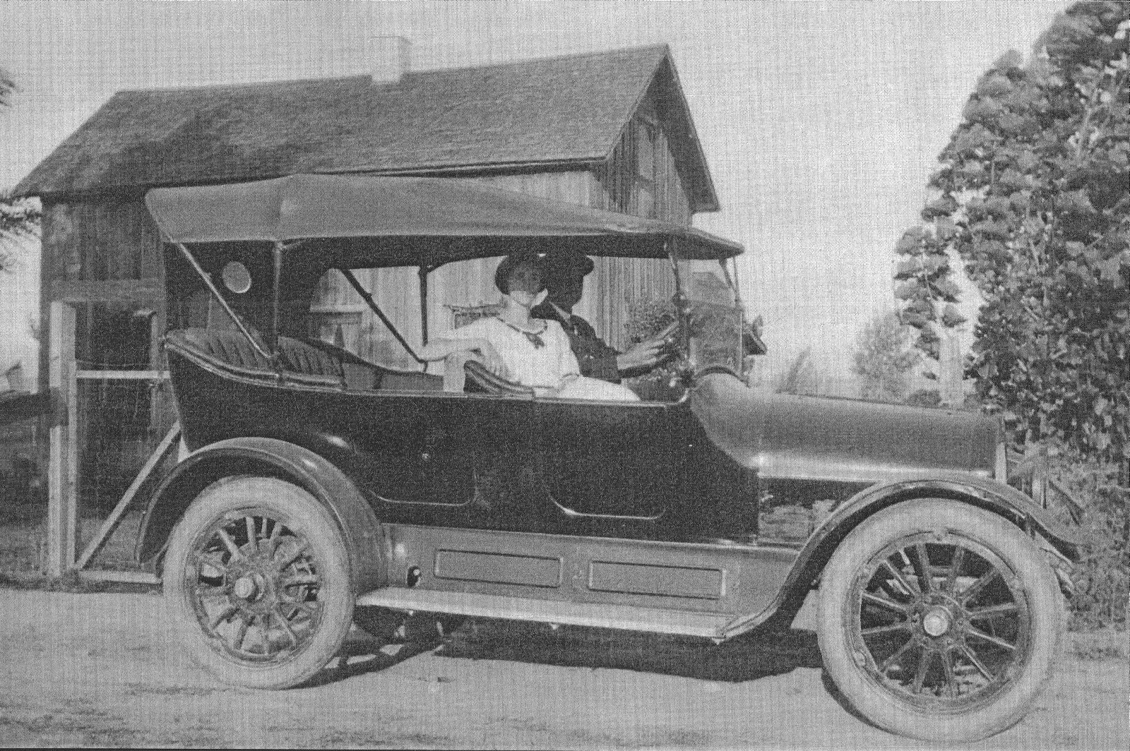 Theo and Mildred Fisher in an Overland car